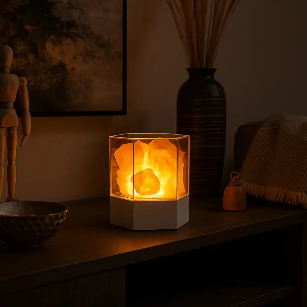 Salt lamp lighting a dark console table